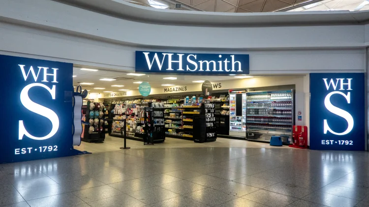 WHSmith storefront beside public Arrivals at Stansted Airport